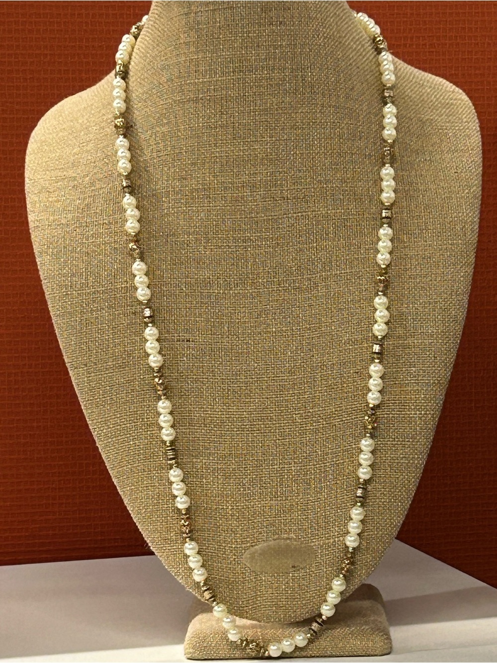Faux pearl necklace with gold accents